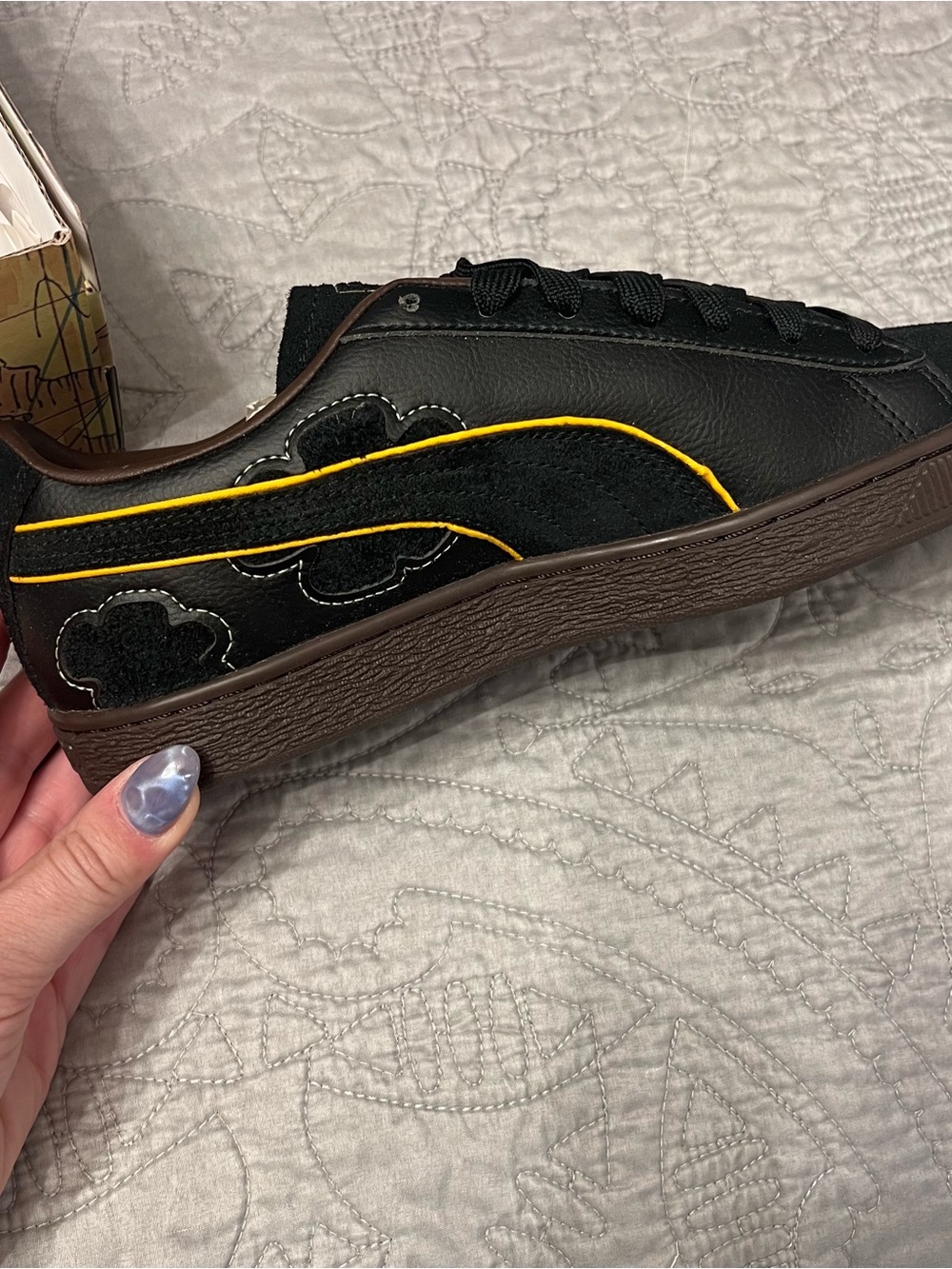 Puma Black Low-Top Sneakers with Yellow Piping